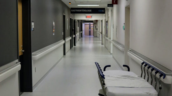 Hallway of a hospital with a bed
